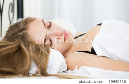 Portrait of girl sleeping in bed. 19956816