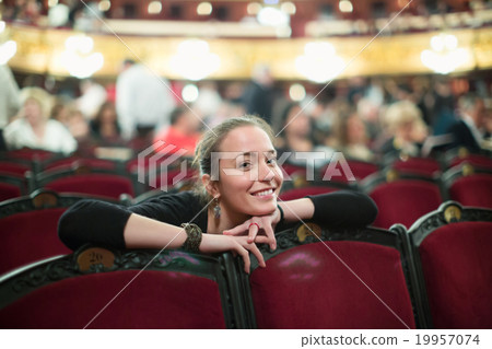 Woman in auditorium of teatre 19957074