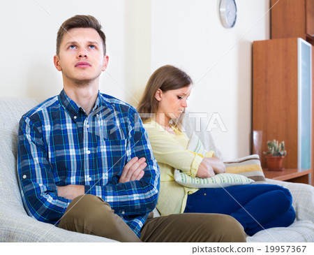Unpleased person criticizing spouse Unpleased person criticizing spouse 19957367