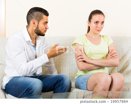 Couple having conflict indoors 19957984