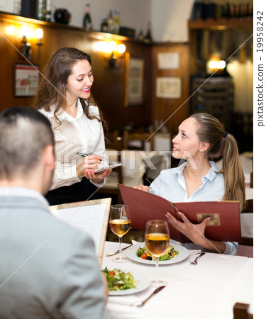 Couple having meal in restaurant Couple having meal in restaurant 19958242