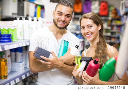 Couple with shampoo in the store. 19958246