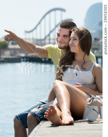 Couple resting on berth 19958305