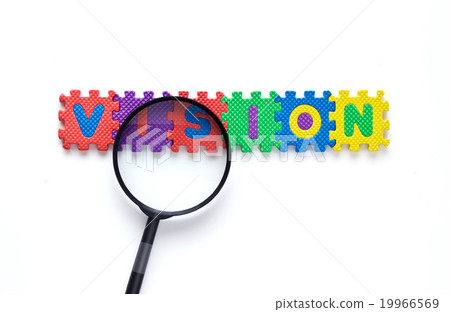 Magnifying glass on the colorful text puzzle 19966569