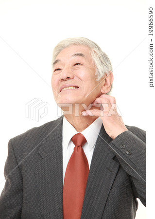 Senior businessman with a stiff neck Senior businessman with a stiff neck 19966590