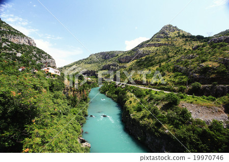 mountain landscape with mountain turbulent river in the gorge mountain landscape with mountain turbulent river in the gorge 19970746