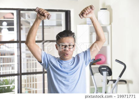 asian senior male with dumbell in the gym asian senior male with dumbell in the gym 19971771