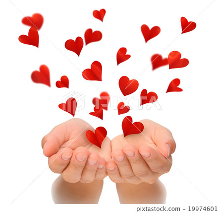 Flying hearts from cupped hands of young woman Flying hearts from cupped hands of young woman 19974601