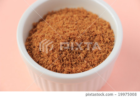 Pink background with coconut and sugar cup Pink background with coconut and sugar cup 19975008