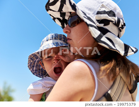 Mother and her little baby child Mother and her little baby child 19975379