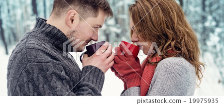 Happy couple drinking tea Happy couple drinking tea 19975935