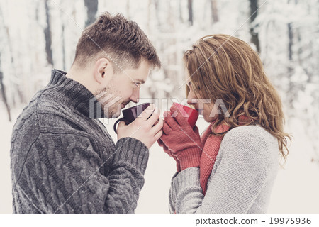 Happy couple drinking tea Happy couple drinking tea 19975936