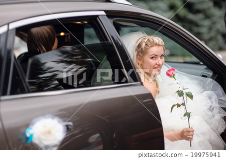 happy bride in a wedding car happy bride in a wedding car 19975941