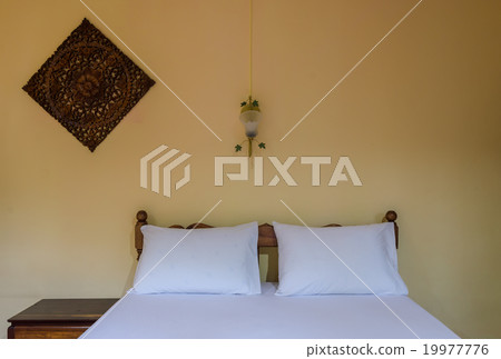 Bedroom with tidy bed 19977776