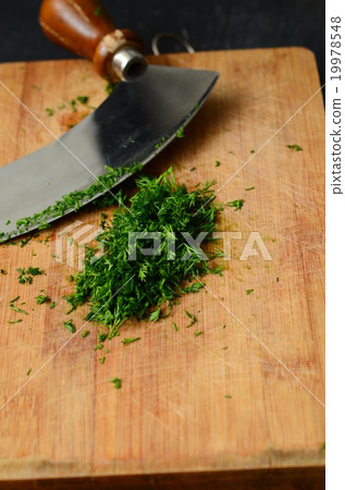Chopping fresh dill Chopping fresh dill 19978548