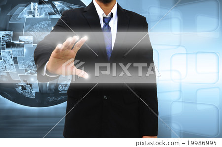 businessman pushing a touch screen interface 19986995