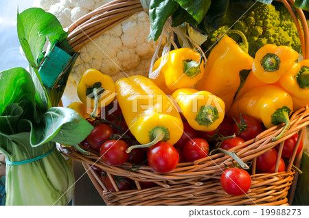 Still life of fresh vegetables and spices on straw 19988273