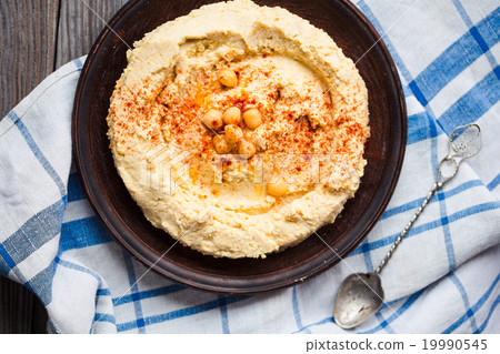 Homemade hummus of chickpeas, tahini and paprika  19990545