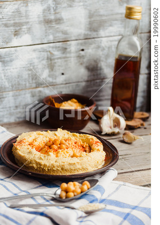 hummus of chickpeas, tahini, paprika in a plate 19990602