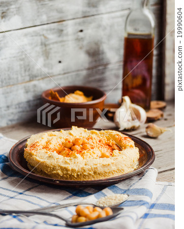 hummus of chickpeas, tahini, paprika in a plate 19990604