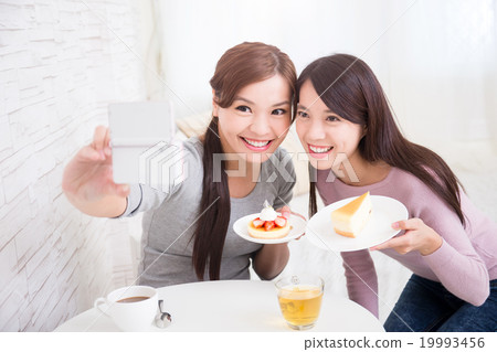 happy young female friends 19993456