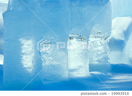 Transparent columns of ice on the snow 19993918