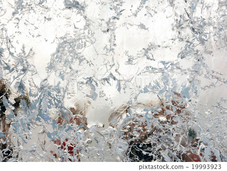Glacial transparent block of ice with patterns. 19993923