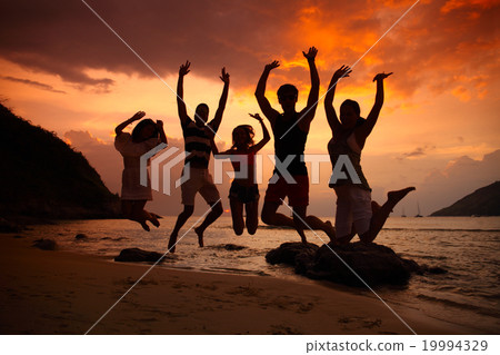 People partying on beach 19994329