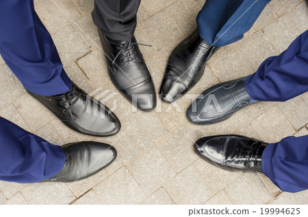 The shoes of the groom's friends. 19994625