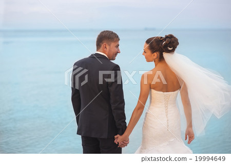 Happy newlyweds outdoor. Happy newlyweds outdoor. 19994649