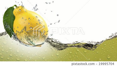 Ripe citrus lemon,amid a spray of juice. Ripe citrus lemon,amid a spray of juice. 19995704
