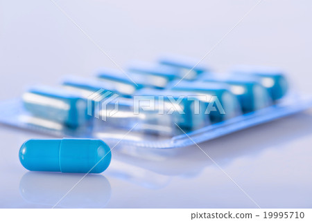 Flat pack of pills is on the surface. Flat pack of pills is on the surface. 19995710