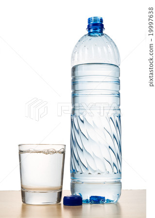 Mineral water in plastic bottle with glass Mineral water in plastic bottle with glass 19997638