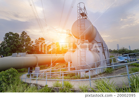 Oil and gas industry refinery factory at sunset Oil and gas industry refinery factory at sunset 20002095