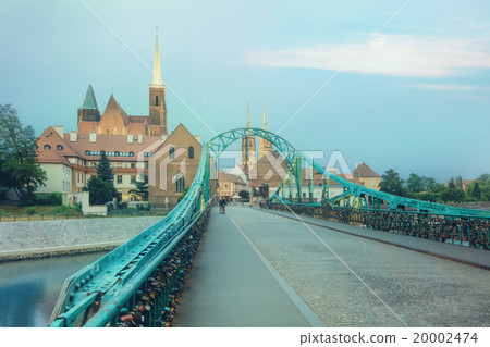 Wroclaw Tumski Island bridge, vivid sunset Wroclaw Tumski Island bridge, vivid sunset 20002474