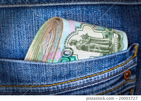Folded Russian rouble bills in the jeans pocket Folded Russian rouble bills in the jeans pocket 20003727