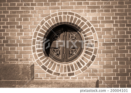 Circle window on the brick wall monochrome style 20004101