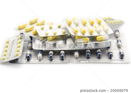 Heap blister packs of colorful pills and capsules 20008079