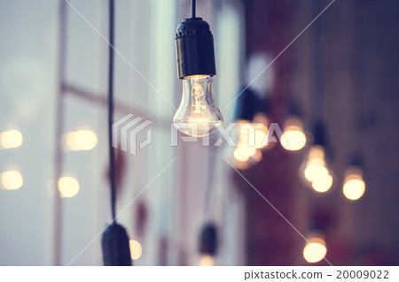 iful festoon light bulb hanging at the window. iful festoon light bulb hanging at the window. 20009022