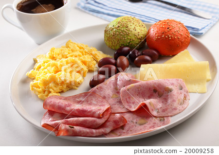Breakfast with sausages, scrambled eggs, cheese, olives, coffee, and buns 20009258