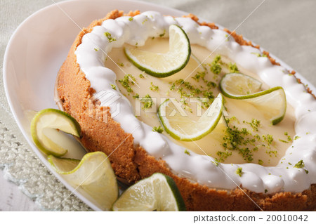 Gourmet lime tart with whipped cream and peel Gourmet lime tart with whipped cream and peel 20010042