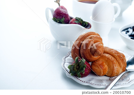 Breakfast with coffee and croissants 20010700