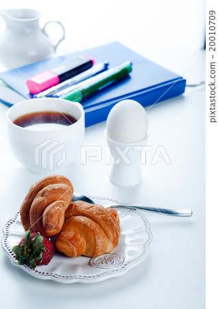 breakfast  croissant  and notebook    20010709