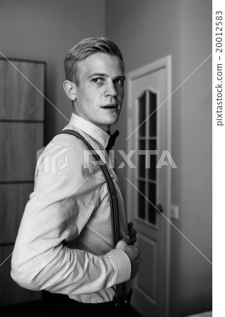 groom in the morning getting ready groom in the morning getting ready 20012583