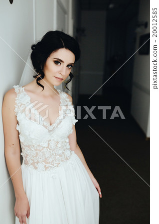 Bride posing in a corridor Bride posing in a corridor 20012585