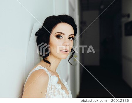 Bride posing in a corridor Bride posing in a corridor 20012586
