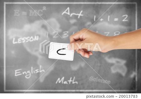 Hand holding card with word of "C" chalkboard background 20013783