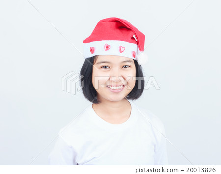 young attractive asian girl in Santa hat young attractive asian girl in Santa hat 20013826