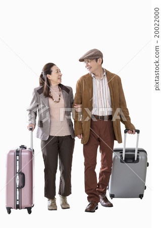 Senior couple with suitcase Senior couple with suitcase 20022000