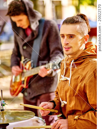 Performance of street musicians 20022570